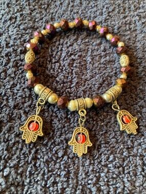 Silver Tone and Garnet ColoredBeaded Hamsa Charm Stretch Bracelet
